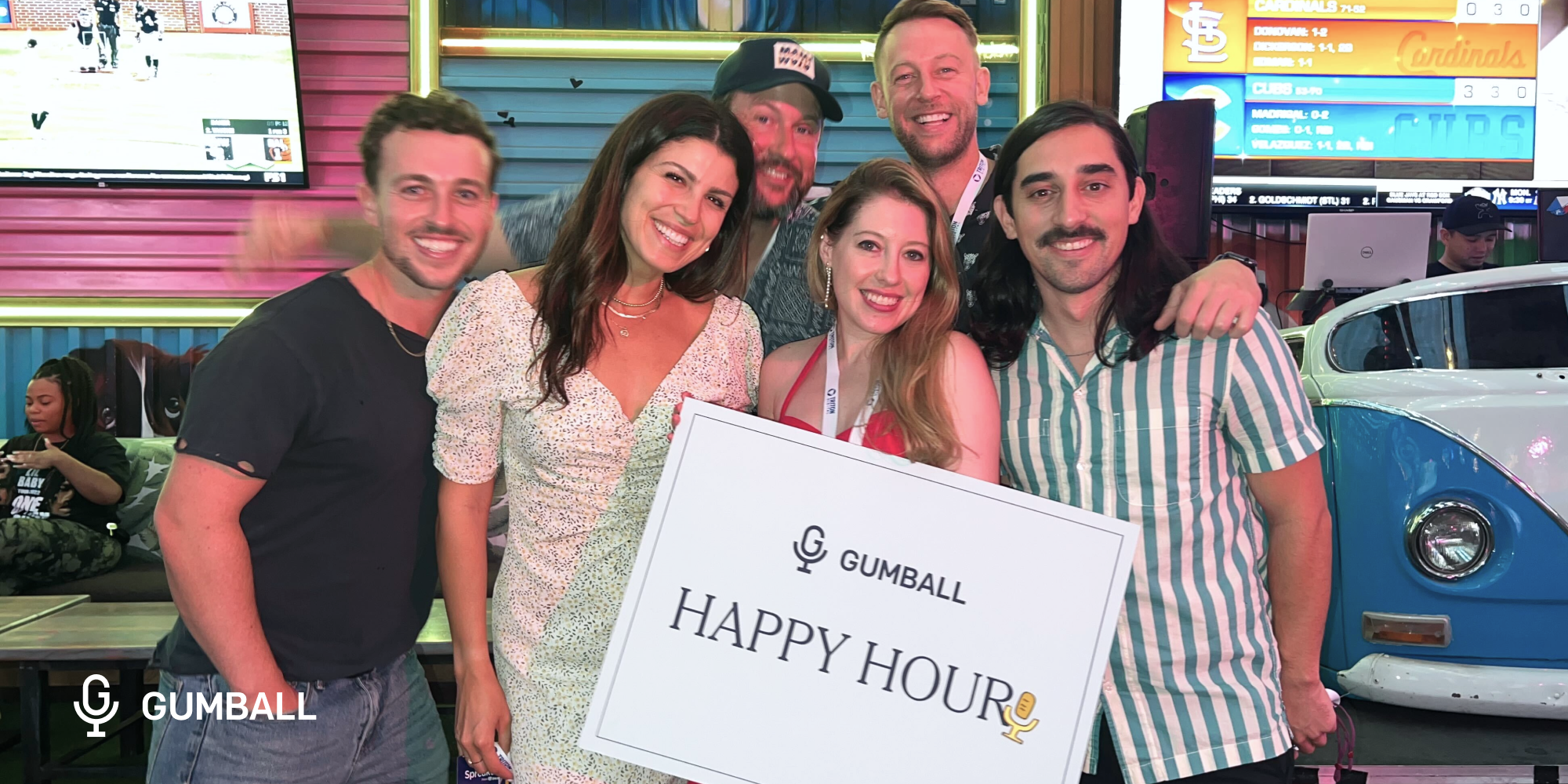 group photo of gumball members at a happy hour event 