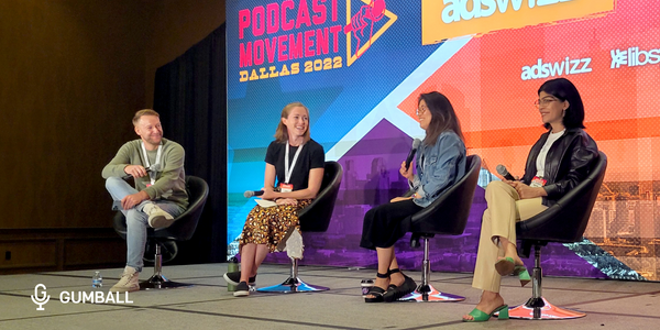 panelists marty michael lisa jacobs sarah kong narisa ladak sitting on a stage holding mics discussing host read ads 