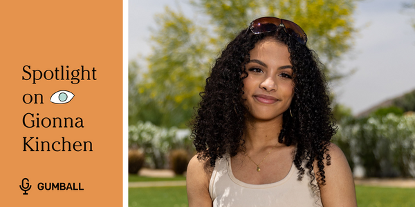 headshot of gionna kinchen against a nature backdrop next to an orange square that says spotlight on gionna kinchen